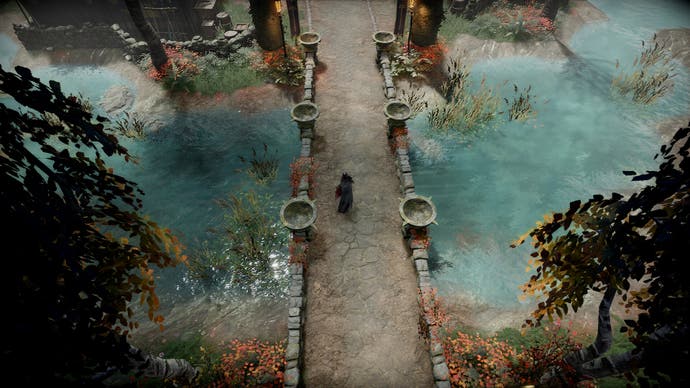 V Rising official screen showing a small vampire character dressed in black cape crossing a stony bridge in detailed, top-down Gothic style