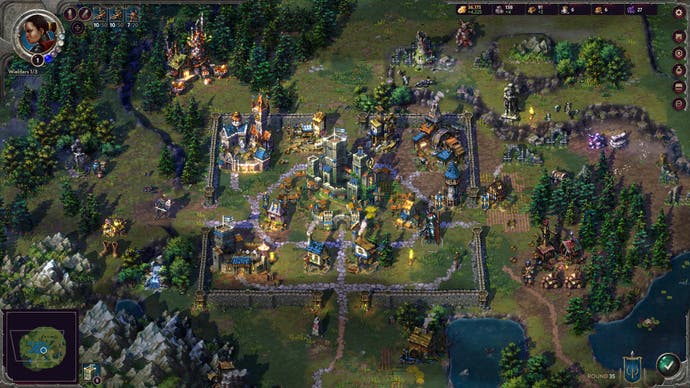 Songs of Conquest screenshot showing a settlement surrounded by grass and woods, in retro PC RTS style.