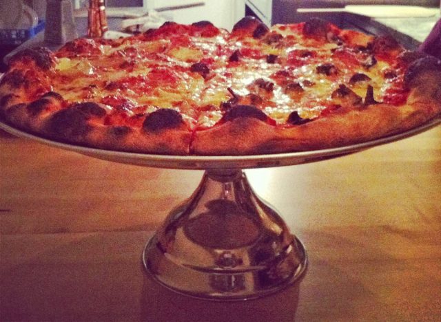 Pizza on a pedestal at Pizzeria Beddia