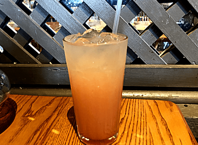 a glass of cracker barrel watermelon lemonade on the restaurant table 
