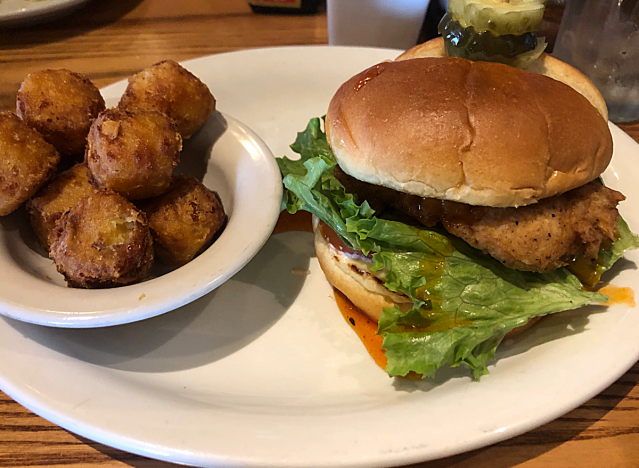 bee sting chicken sandwich from cracker barrel on a plate 