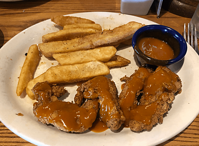 bee sting tenders and fries on a plate from cracker barrel 